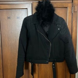 Distressed black denim jacket with detachable faux fur collar by Cloth& Stone